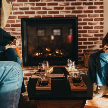 Dunning Estates - Cozy up by the fire with friends and a glass of red - Wineries Near Me - Caldwell, Idaho
