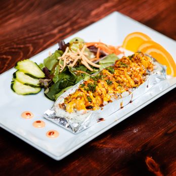 Rolls and Bowls - a plate of food on a table - Sushi Bars Near Me - San Luis, Arizona Rolls and Bowls - a plate of food on a table - Sushi Bars Near Me - San Luis, Arizona