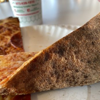 Vinni's Pizzarama - Hard bottom crust on a plain slice. - Pizza Near Me - Wayne, New Jersey
