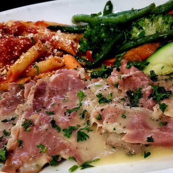 Allegro Italian Kitchen - Vitello alla Pizzaiola: Veal sauteed with capers, oregano, garlic, wine and marinara sauce - Italian Near Me - Edmonton, Alberta Allegro Italian Kitchen - Vitello alla Pizzaiola: Veal sauteed with capers, oregano, garlic, wine and marinara sauce - Italian Near Me - Edmonton, Alberta