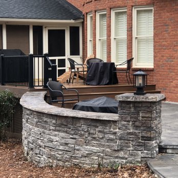 Carolina Decks & Outdoor Living - the back of a brick patio - General Contractors Near Me - Indian Trail, North Carolina