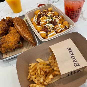 Bruxie - The crispy, Loaded spicy tots, Waffle fries, Fresh orange juice, Strawberry lemonade. - Sandwiches Near Me - Costa Mesa, California Bruxie - The crispy, Loaded spicy tots, Waffle fries, Fresh orange juice, Strawberry lemonade. - Sandwiches Near Me - Costa Mesa, California
