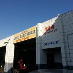 Joe's Auto Services - Front of building is set back off the road a bit, next to an autobody shop. Don't drive too quickly or you'll zip right past it