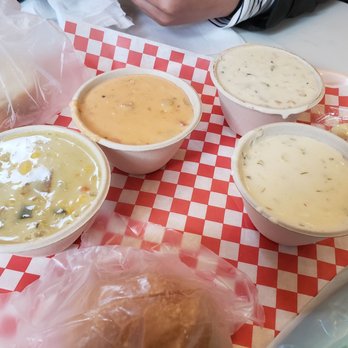 Pike Place Chowder - Left to right: lime coconut, salmon, New England, seared scallops - Seafood Near Me - Seattle, Washington