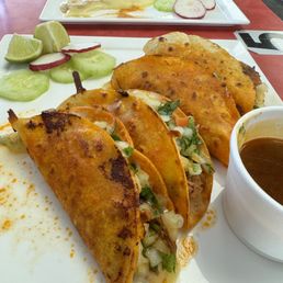 a plate of tacos and a cup of coffee a plate of tacos and a cup of coffee