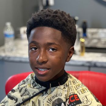 Crisp Cuts Barbershop Main St - Crisp Youth haircut, Textured top, Taper fade. - Barbers Near Me - Kansas City, Missouri Crisp Cuts Barbershop Main St - Crisp Youth haircut, Textured top, Taper fade. - Barbers Near Me - Kansas City, Missouri