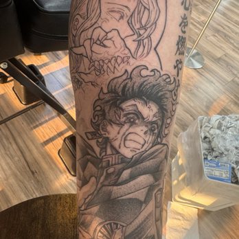 Scratch Tattoo Studio - Tanjiro and Muzan - Tattoo Near Me - Upland, California Scratch Tattoo Studio - Tanjiro and Muzan - Tattoo Near Me - Upland, California