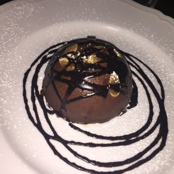 Le Virtu - Lu Parrozz' Flourless orange-almond cake, chocolate ganache, saffron-honey - Italian Near Me - Philadelphia, Pennsylvania Le Virtu - Lu Parrozz' Flourless orange-almond cake, chocolate ganache, saffron-honey - Italian Near Me - Philadelphia, Pennsylvania