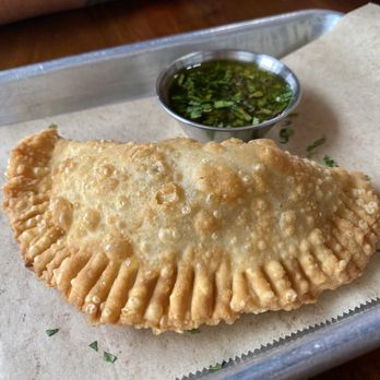 Aji Peruvian Cuisine - Beef Empanada - love the dough and chimichurri. - Peruvian Near Me - Long Beach, California Aji Peruvian Cuisine - Beef Empanada - love the dough and chimichurri. - Peruvian Near Me - Long Beach, California