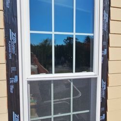 KJC Construction - Installing custom window