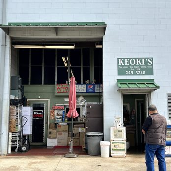 Keoki's - a man standing in front of a store - Breakfast & Brunch Near Me - Lihue, Hawaii