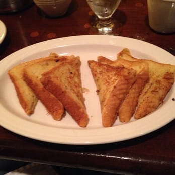 Gatwicks - a plate of toasted bread on a table - Steakhouses Near Me - Port Saint Lucie, Florida Gatwicks - a plate of toasted bread on a table - Steakhouses Near Me - Port Saint Lucie, Florida