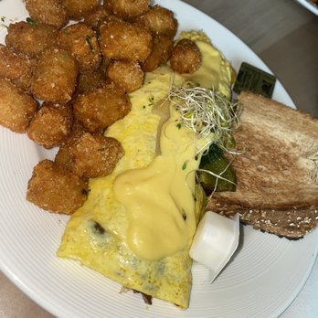 Bay Local Eatery - Chicks Beach Delight w/Hollandaise & Parmesan Garlic Tots - Breakfast & Brunch Near Me - Virginia Beach, Virginia