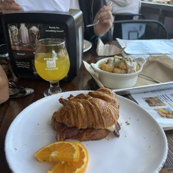 Burger Bench - Pesto, egg, bacon, cheese croissant with a mimosa! Excited to see they have weekend breakfast now! - American Near Me - Escondido, California Burger Bench - Pesto, egg, bacon, cheese croissant with a mimosa! Excited to see they have weekend breakfast now! - American Near Me - Escondido, California