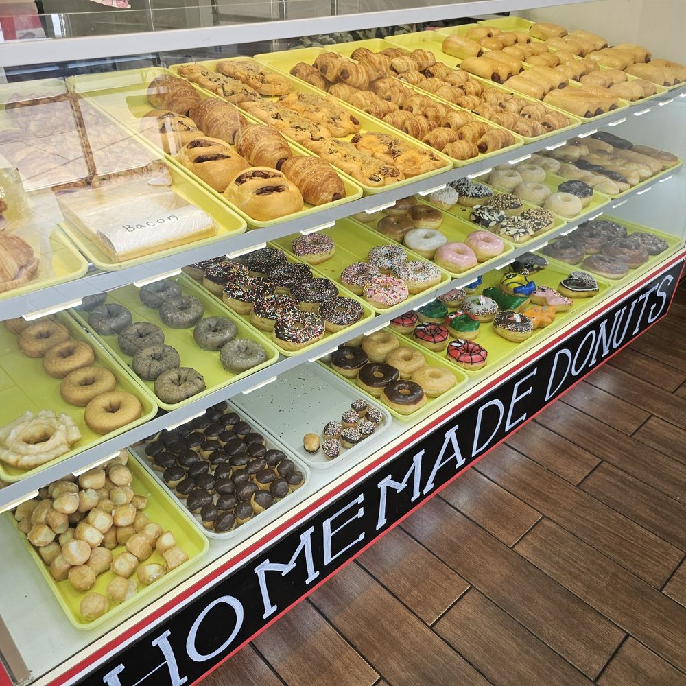 Donuts - a display case of a variety of donuts - Donuts Near Me - Dallas, Texas