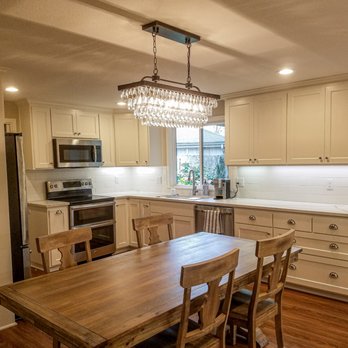 Schar Construction - a kitchen with a table and chairs - General Contractors Near Me - Eugene, Oregon