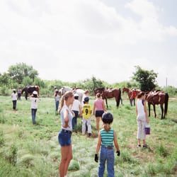 Golden Vista Equestrian Center - Campers readying for a trail ride!