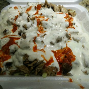 Lazeez - Large chicken on the rocks, medium spicy. Insanity in a take out box. - Mediterranean Near Me - Mississauga, Ontario