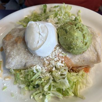 La Piñata - Super beef burrito with dollops of sour cream and guacamole! - Mexican Near Me - Hayward, California