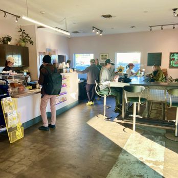 Strip Mall - There's the large counter height table. - Coffee & Tea Near Me - Phoenix, Arizona