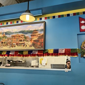 Kathmandu Momocha - Wall decorations and Kitchen passthru. - Himalayan/Nepalese Near Me - Seattle, Washington