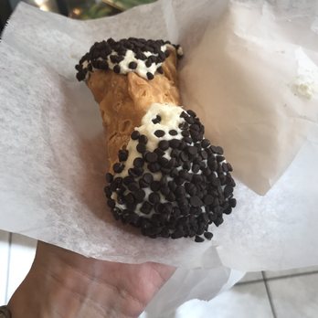 Mike's Pastry - One big chocolate chip cannoli ($4) BUT too much filling and not crispy enough. - Bakeries Near Me - Cambridge, Massachusetts Mike's Pastry - One big chocolate chip cannoli ($4) BUT too much filling and not crispy enough. - Bakeries Near Me - Cambridge, Massachusetts