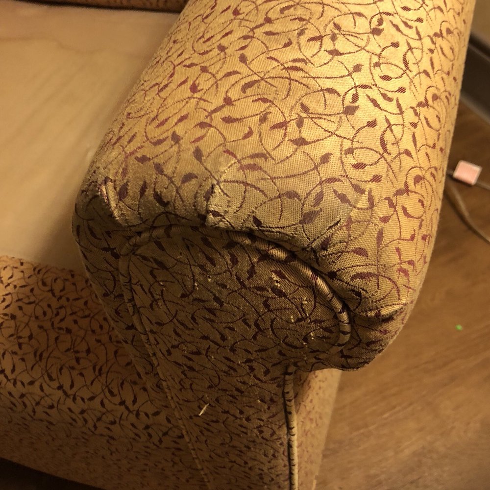Red Lion Hotel Redding - Dirty arm of chair. It also looks like a cat used it for a scratching post - Hotels Near Me - Redding, California Red Lion Hotel Redding - Dirty arm of chair. It also looks like a cat used it for a scratching post - Hotels Near Me - Redding, California