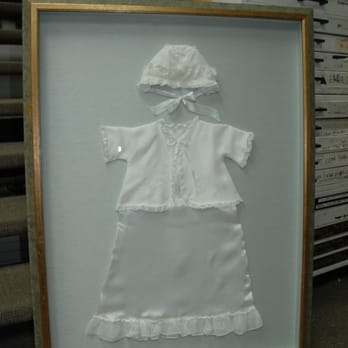 Flax Art & Frame - A shadowboxed christening gown we framed for a client. Preserve those memories and hang them in plain sight to enjoy day after day. - Framing Near Me - Chicago, Illinois