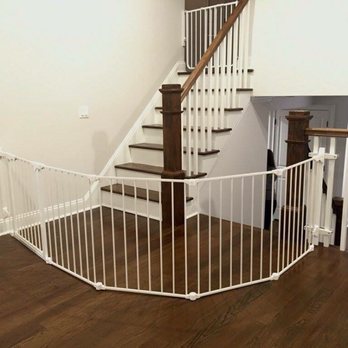 Baby Safe Homes - One white configure gate used to block off two staircases. - Childproofing Near Me - Livingston, New Jersey Baby Safe Homes - One white configure gate used to block off two staircases. - Childproofing Near Me - Livingston, New Jersey
