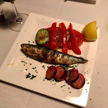 Porto Mar - grilled fish and vegetables on a white plate - Portuguese Near Me - Montreal, Quebec Porto Mar - grilled fish and vegetables on a white plate - Portuguese Near Me - Montreal, Quebec