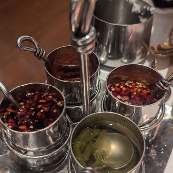 Nan Thai Fine Dining - Spice rack brought over to the table - Thai Near Me - Atlanta, Georgia Nan Thai Fine Dining - Spice rack brought over to the table - Thai Near Me - Atlanta, Georgia