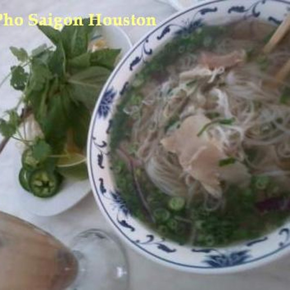 Pho Saigon - My food came so fast. This was a small bowl of pho with my favorite dried plum drink - Xi Mui. - Vietnamese Near Me - Houston, Texas