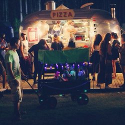 Happy Camper Pizza - Serving up pizzas from the airstream. Image credit: Happy Camper