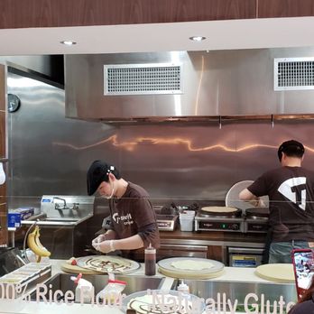 T-Swirl Crepe - Crepes being cooked in back, prepared meticulously by employee in front - Creperies Near Me - Flushing, New York T-Swirl Crepe - Crepes being cooked in back, prepared meticulously by employee in front - Creperies Near Me - Flushing, New York