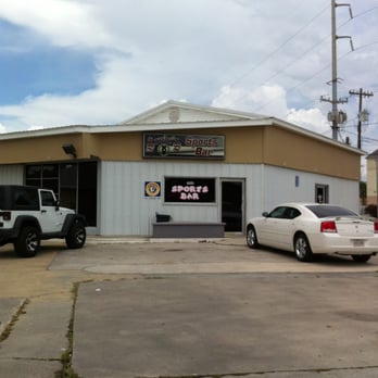Sports Bar - two cars parked in front of a sports bar - Sports Bars Near Me - Morgan City, Louisiana Sports Bar - two cars parked in front of a sports bar - Sports Bars Near Me - Morgan City, Louisiana