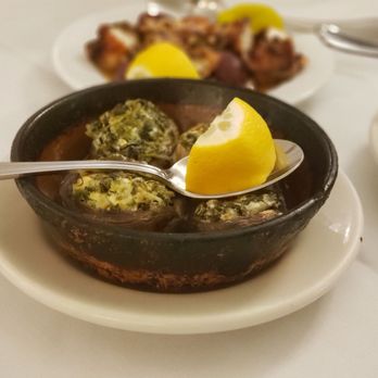 Taverna Cretekou - a bowl of soup with a lemon wedge - Greek Near Me - Alexandria, Virginia Taverna Cretekou - a bowl of soup with a lemon wedge - Greek Near Me - Alexandria, Virginia