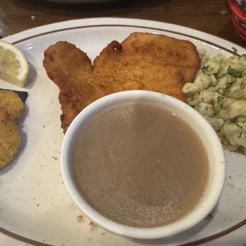 Prost - Pork schnitzel, gravy, spaetzle and pickles.  Had already ate half the schnitzel when I remembered I needed a pic!   Oops - Beer Bar Near Me - Madison, Wisconsin