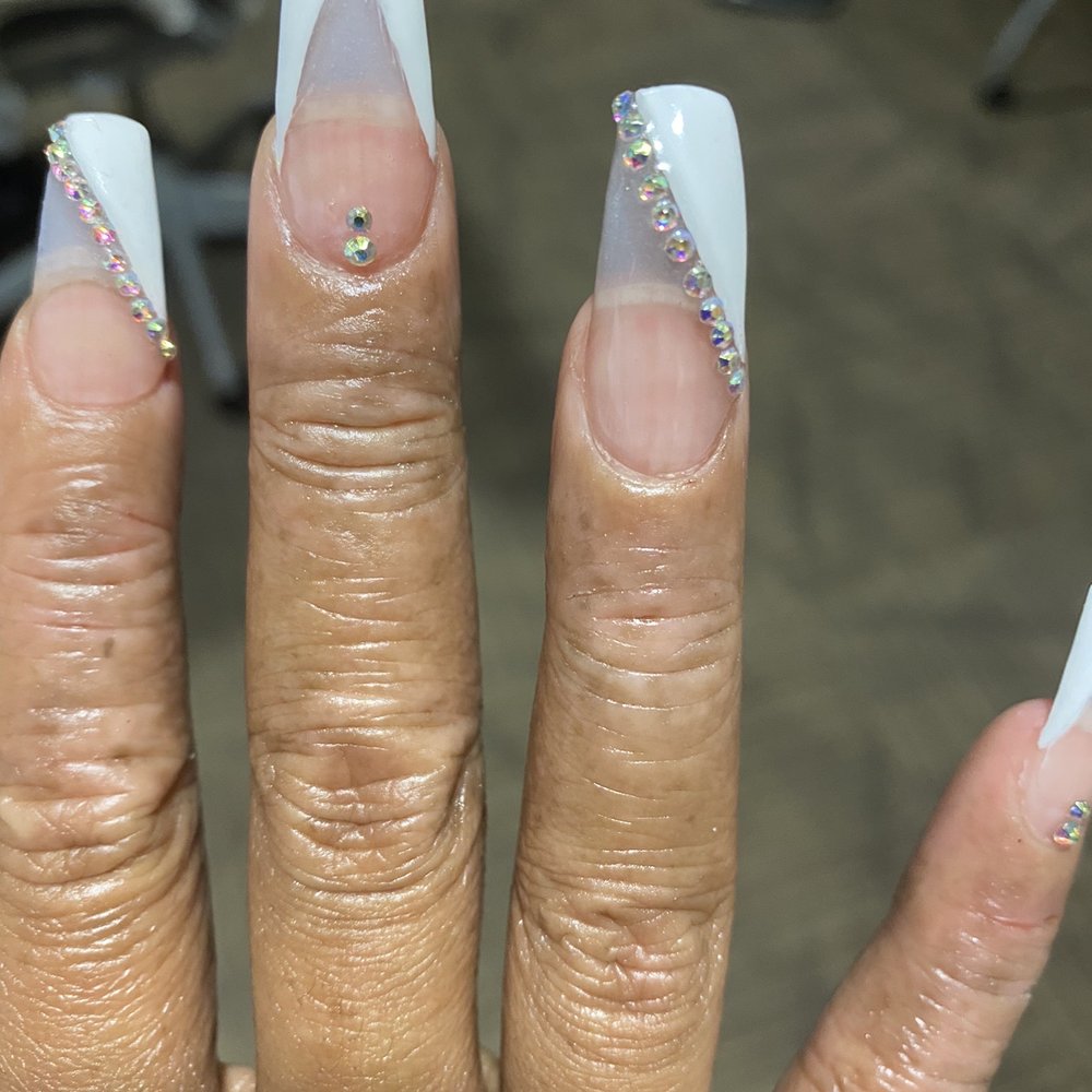 Look how unclean the lines! You can even see my natural nails because They were cheap With the clear gel polish! $80 for this!