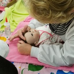 Nurse Brenda getting Sophia ready.