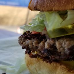 A 6 oz. Grind cheeseburger. A 6 oz. Grind cheeseburger.