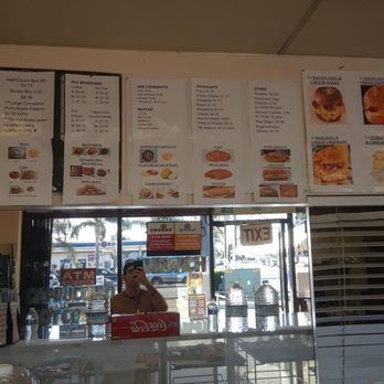 The Donut House - Price for sandwiches and has pictures to look for whichever one you want. - Donuts Near Me - Compton, California