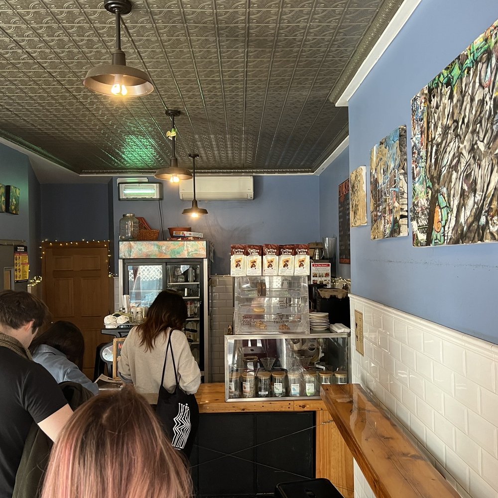 Elsewhere Espresso - a group of people in a coffee shop - Coffee & Tea Near Me - New York, New York