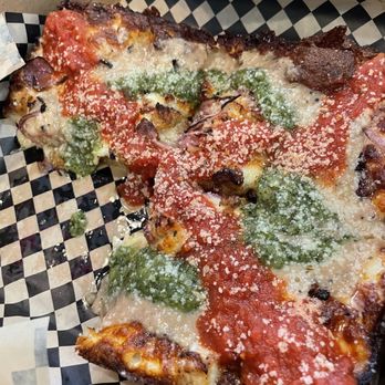 MOTO - Edmonds - Mr pig! The OG. Lechon kawali (Filipino pork belly), spicy pork sausage, Onion, MOTO cheese blend, topped with calamansi lime sauce - Pizza Near Me - Edmonds, Washington