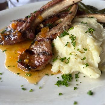 Capers - a plate of food with mashed potatoes and gravy - Bars Near Me - Kennesaw, Georgia