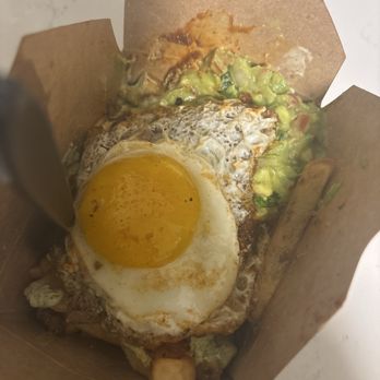 The Great White Hut - Carne asada Fries with a runny egg, Diablo sauce and guacamole. - Burgers Near Me - Glendale, California The Great White Hut - Carne asada Fries with a runny egg, Diablo sauce and guacamole. - Burgers Near Me - Glendale, California