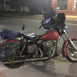 a motorcycle parked on the side of the road