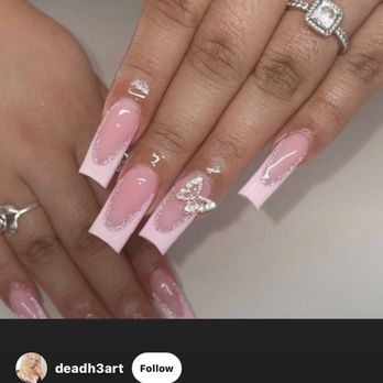 Mila Nails and Spa - I asked for this - Hands with pink, decorated nails and multiple diamond rings, including a large engagement ring, are shown in this close-up image. - Nail Salons Near Me - Gloucester, Massachusetts