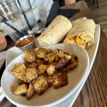 Carnivore - Breakfast burrito and potato! - Steakhouses Near Me - St. Louis, Missouri