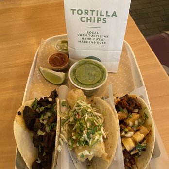 Tallboy Taco - L-R: Birria Short Rib / Crispy Fish Taco / Pork Al Pastor / Guacamole & Chips & Salsa - Tacos Near Me - Chicago, Illinois Tallboy Taco - L-R: Birria Short Rib / Crispy Fish Taco / Pork Al Pastor / Guacamole & Chips & Salsa - Tacos Near Me - Chicago, Illinois