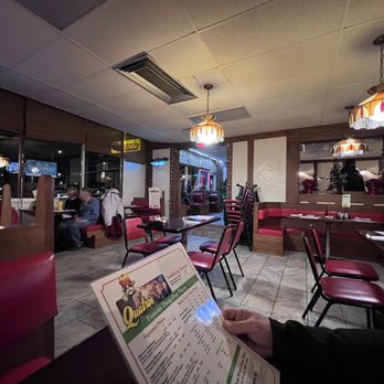 Quatro's Deep Pan Pizza - The lobby has a retro vibe (opened in the 1970's) - Pizza Near Me - Carbondale, Illinois Quatro's Deep Pan Pizza - The lobby has a retro vibe (opened in the 1970's) - Pizza Near Me - Carbondale, Illinois
